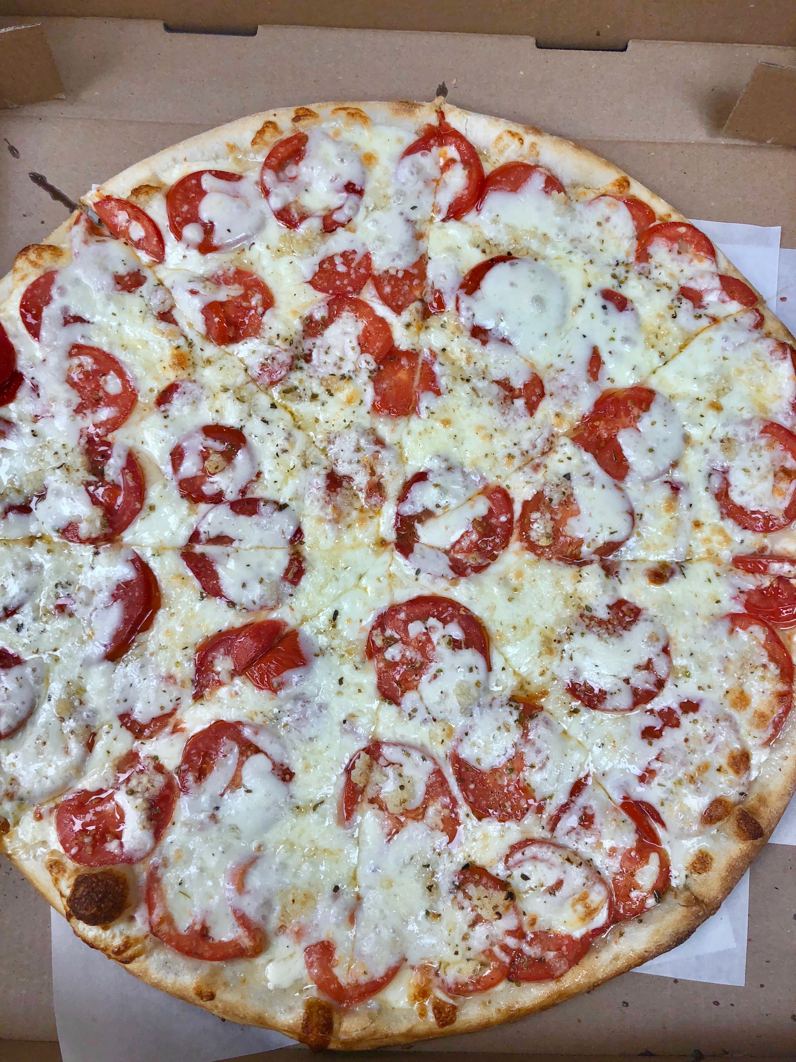 Order Tomato & Garlic Pizza food online from Mario's Pizzeria store, Oyster Bay on bringmethat.com