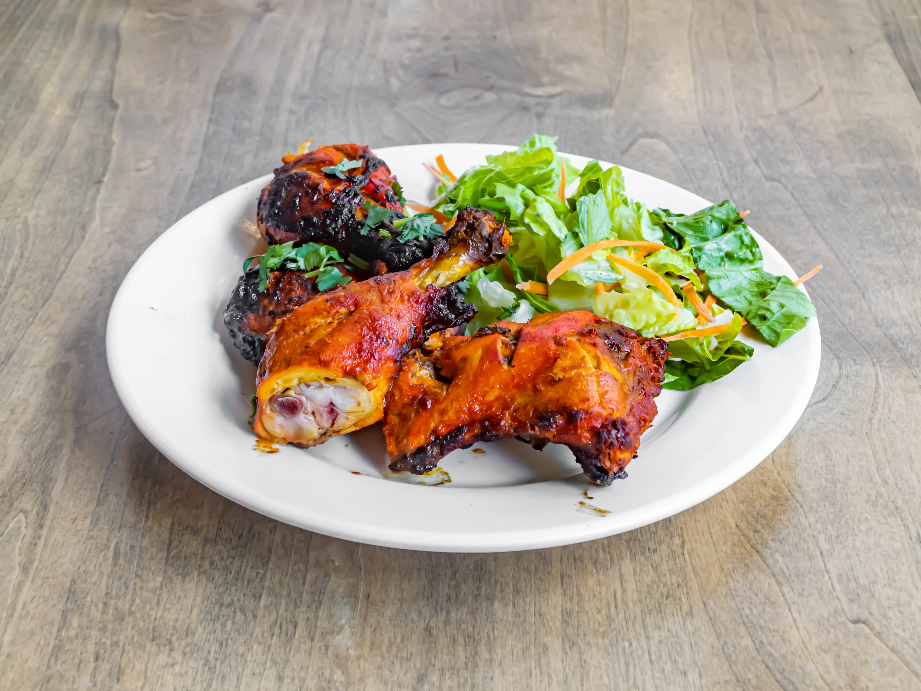 Order 4 Pieces Chicken Tandoori  food online from Biryani Kabob House store, Los Angeles on bringmethat.com