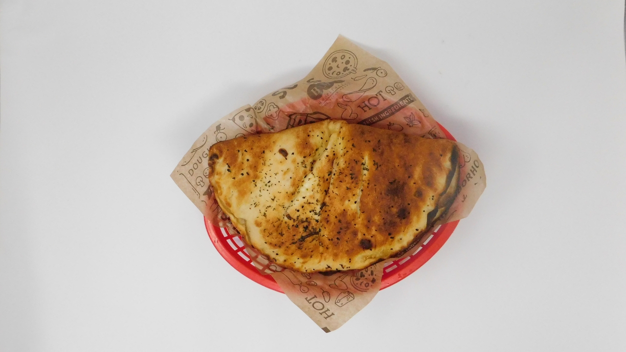 Order 4-Cheese Calzone food online from Spinners store, Albany on bringmethat.com
