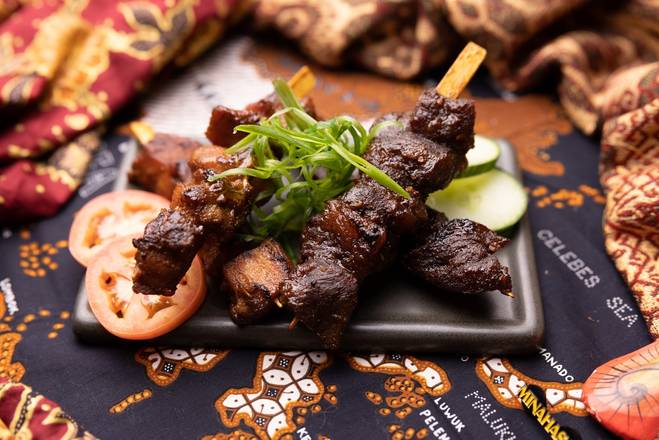 Order Pork Sate (1pc) food online from Naha store, Chicago on bringmethat.com