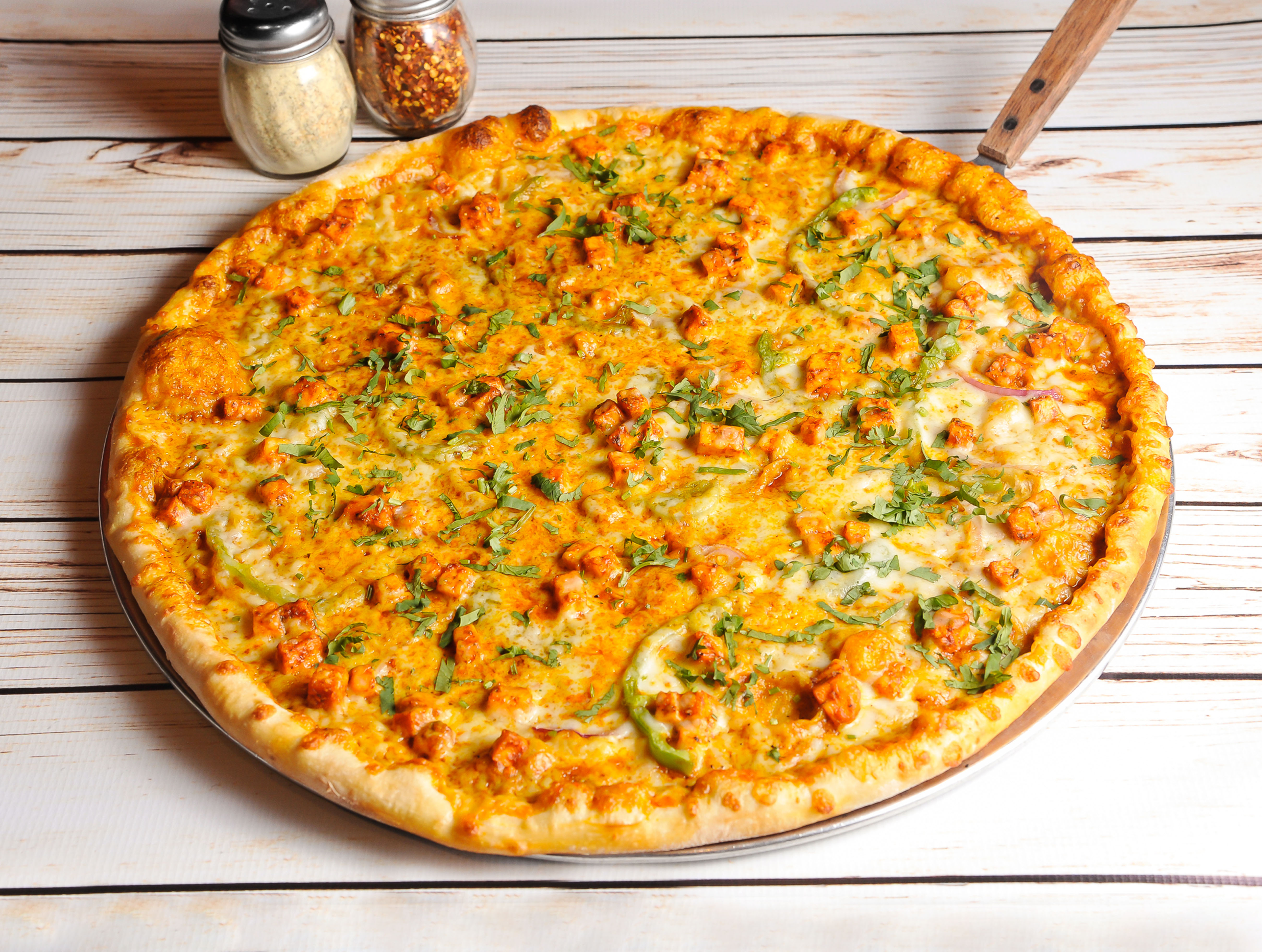 Order Paneer Tikka Pizza food online from Flippin Pizza store, Alpharetta on bringmethat.com