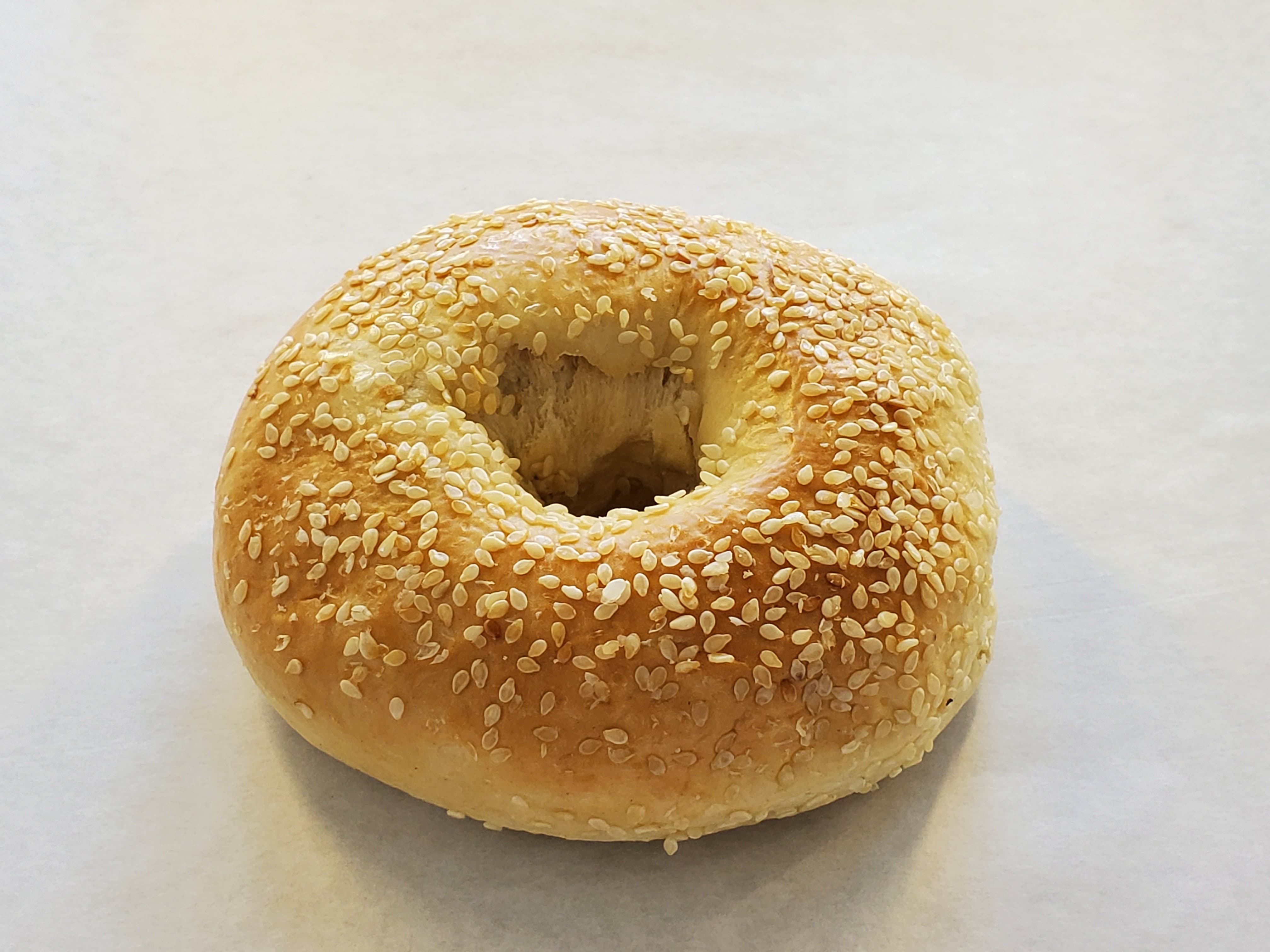 Order Sesames seed bagel toasted cream cheese food online from Honey Donuts store, Crowley on bringmethat.com