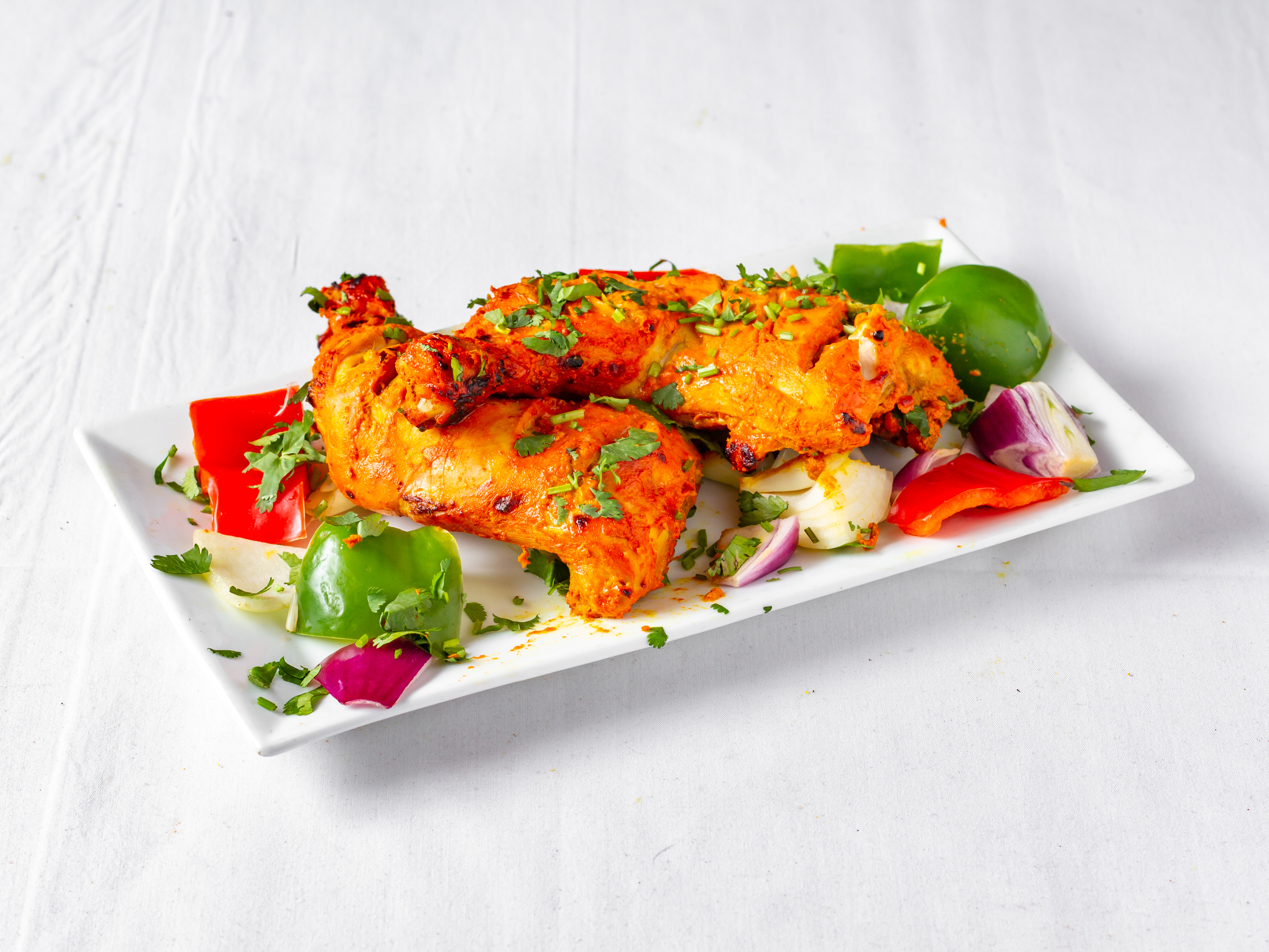 Order Large Tandoori Chicken food online from India Palace store, Cockeysville on bringmethat.com
