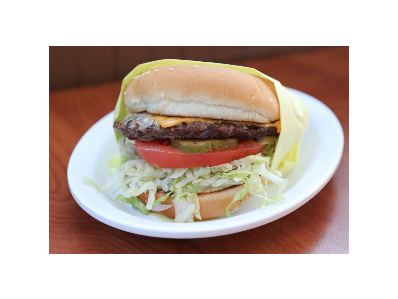 Order Cheeseburger food online from Norm Famous Burgers store, Whittier on bringmethat.com
