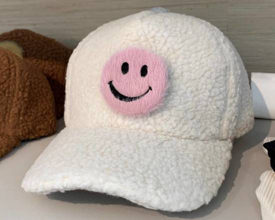 Order Happy Face Sherpa Hat (Cream) food online from Out Of Office at MESH space store, Redondo Beach on bringmethat.com