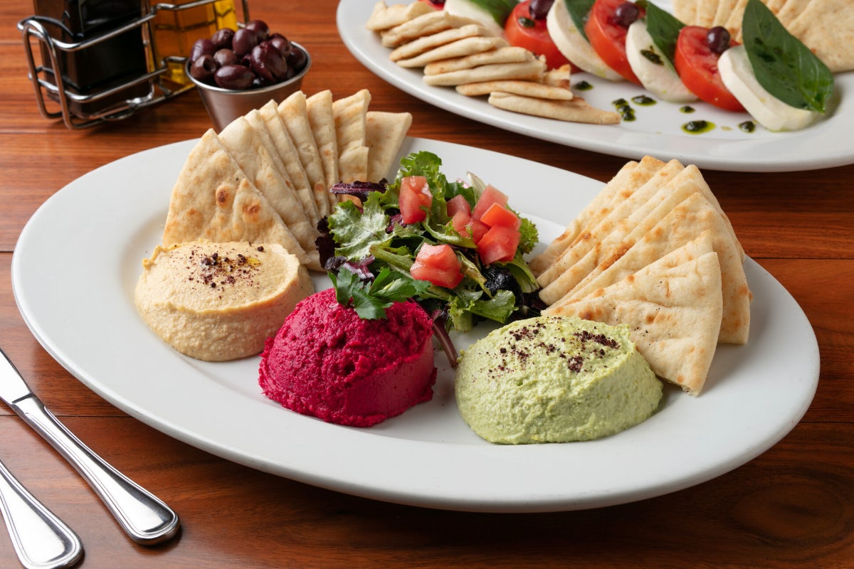 Order Hummus Trio (A Must) food online from Panini Kabob Grill store, Woodland Hills on bringmethat.com