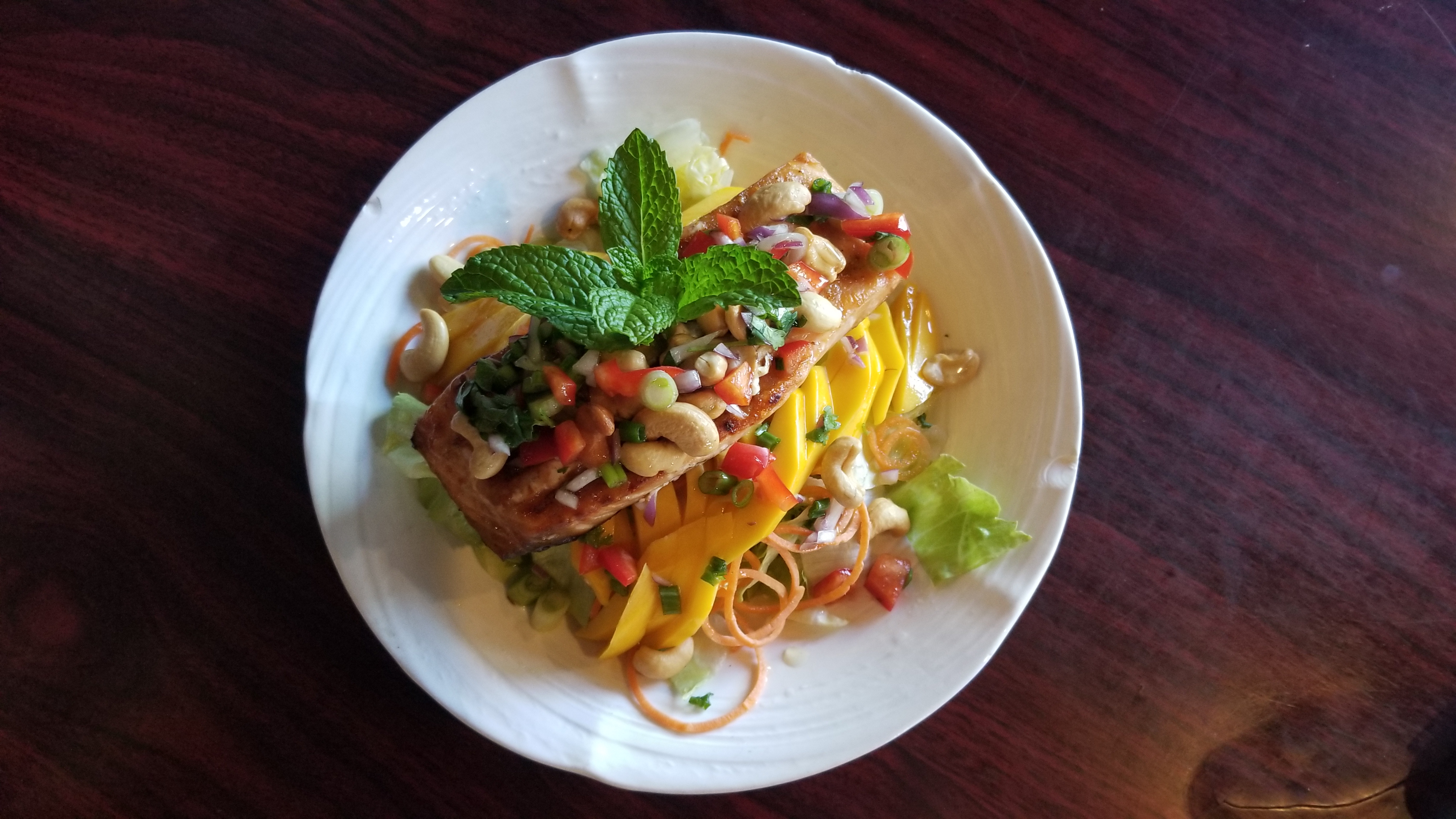 Order S2. Salmon Mango Salad food online from Chai Thai Noodle store, Oakland on bringmethat.com