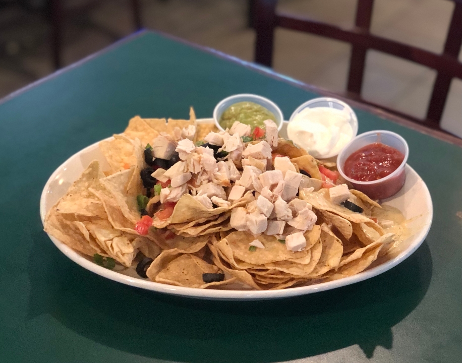 Order White Queso Nachos food online from Stained Glass Pub store, Elkridge on bringmethat.com