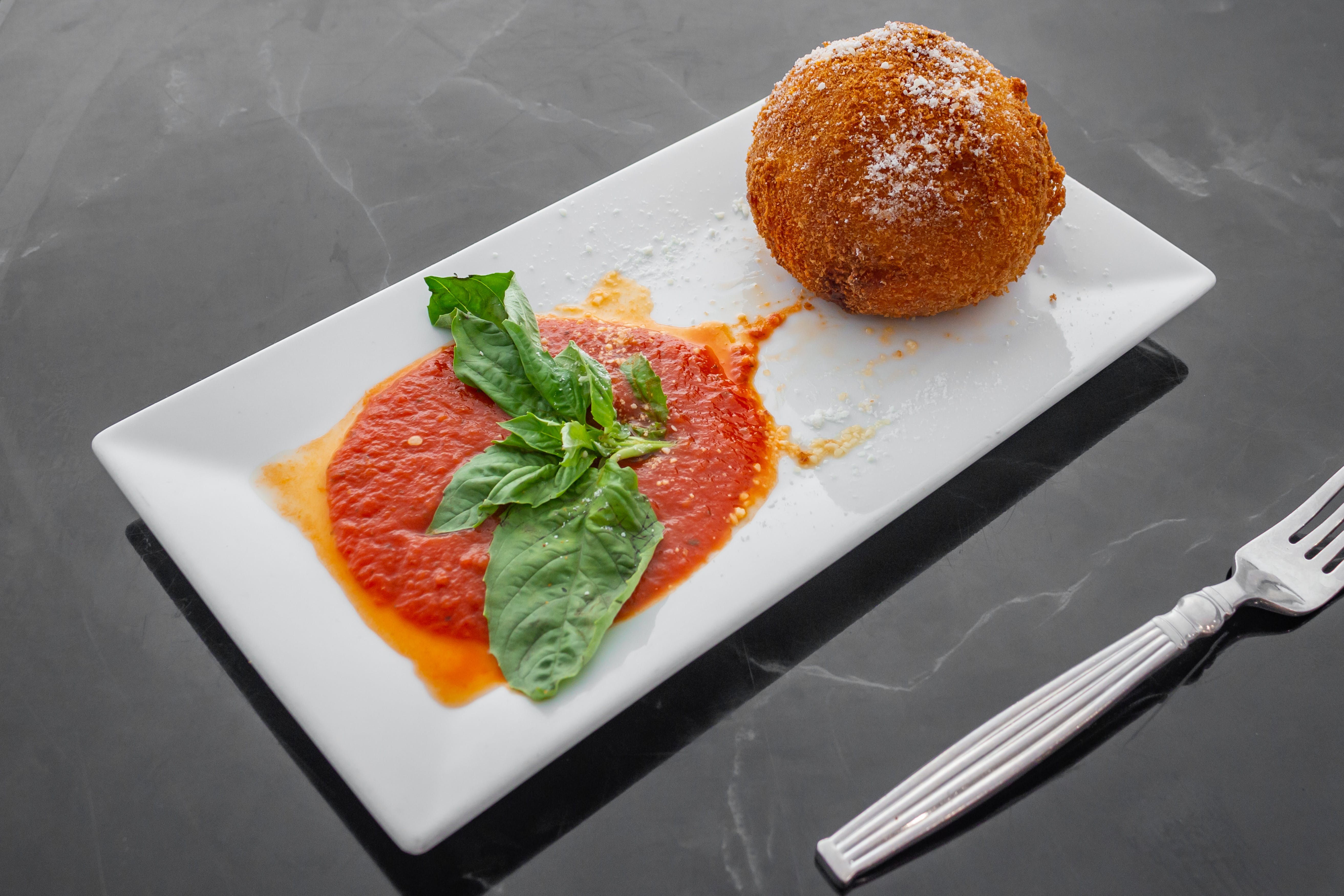 Order Sicilian Rice Ball - Appetizer food online from Sicily Pizzeria Trattoria store, Garfield on bringmethat.com