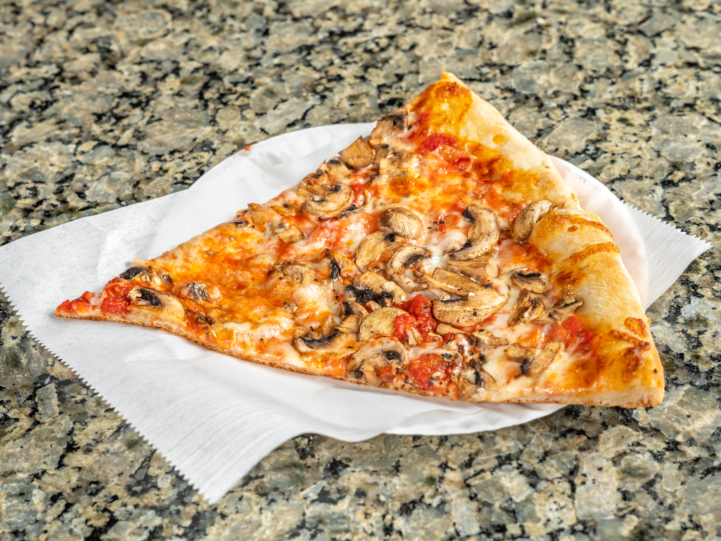 Order Mushroom Pizza Slice food online from Planet Pizza store, Greenwich on bringmethat.com