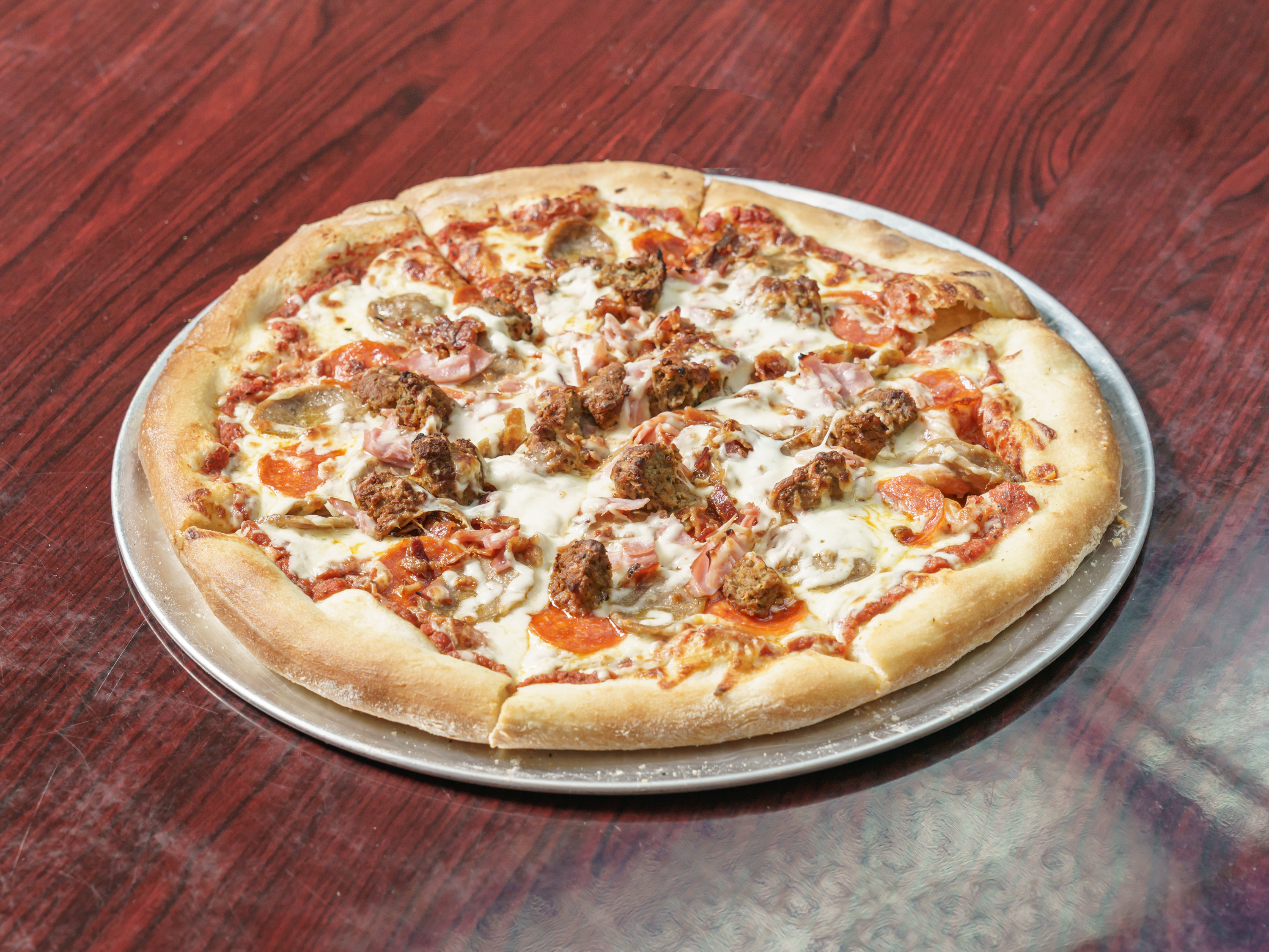 Order Meat Lovers Pizza food online from Jimmy Da Greek Deli store, Yorktown on bringmethat.com