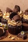 Order Peanut Butter Stuffed Cupcake food online from Small Cupcakes and Cake Factory store, Raleigh on bringmethat.com