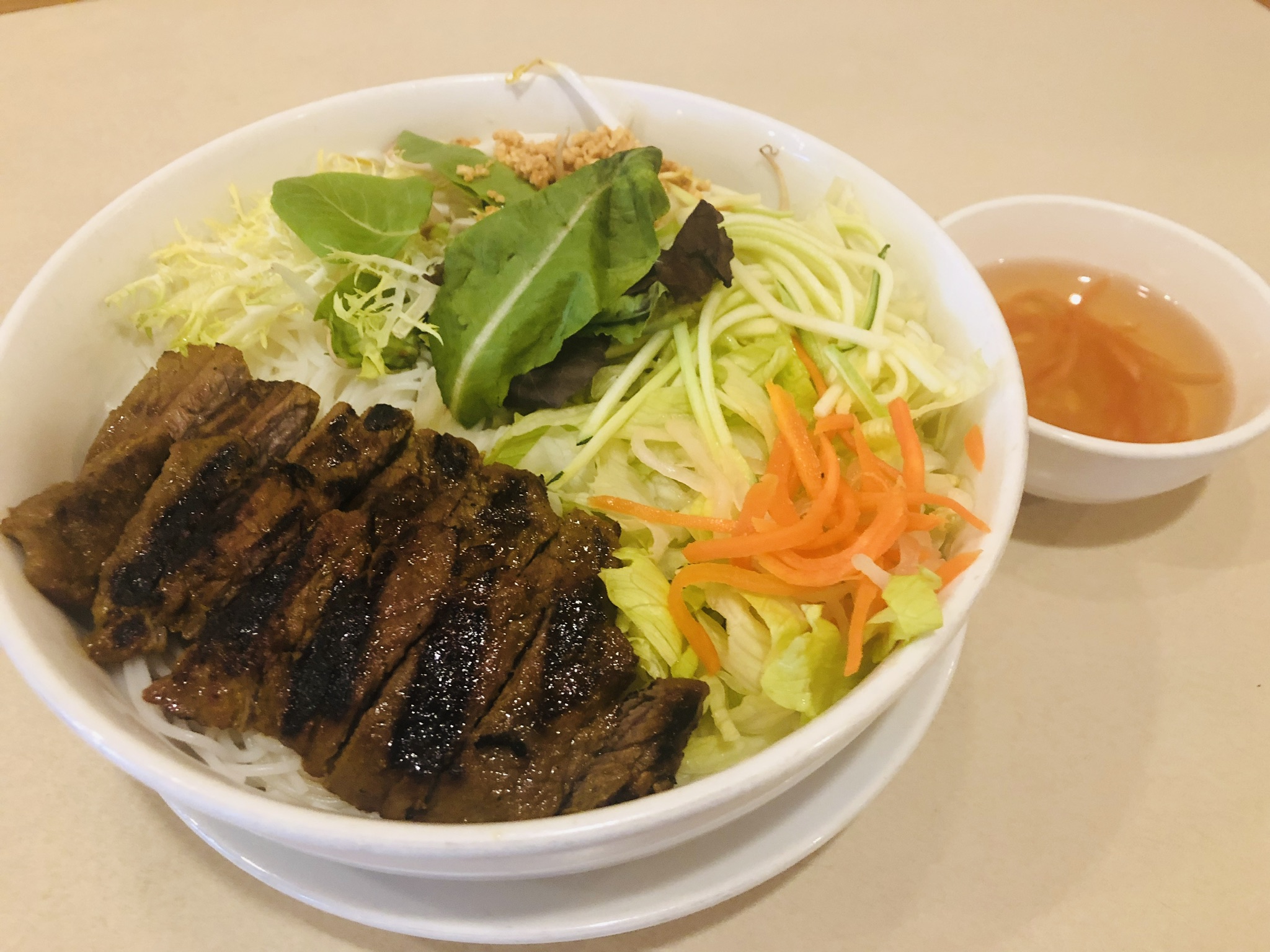 Order NS10. Grilled Beef Vermicelli Bun food online from Pho and Thai store, Belmont on bringmethat.com