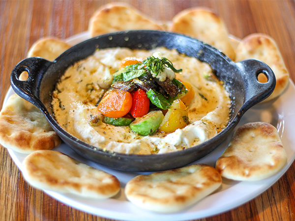 Order Goat Cheese & Roasted Vegetable Dip food online from Gravity Taphouse Grille store, Grand Rapids on bringmethat.com