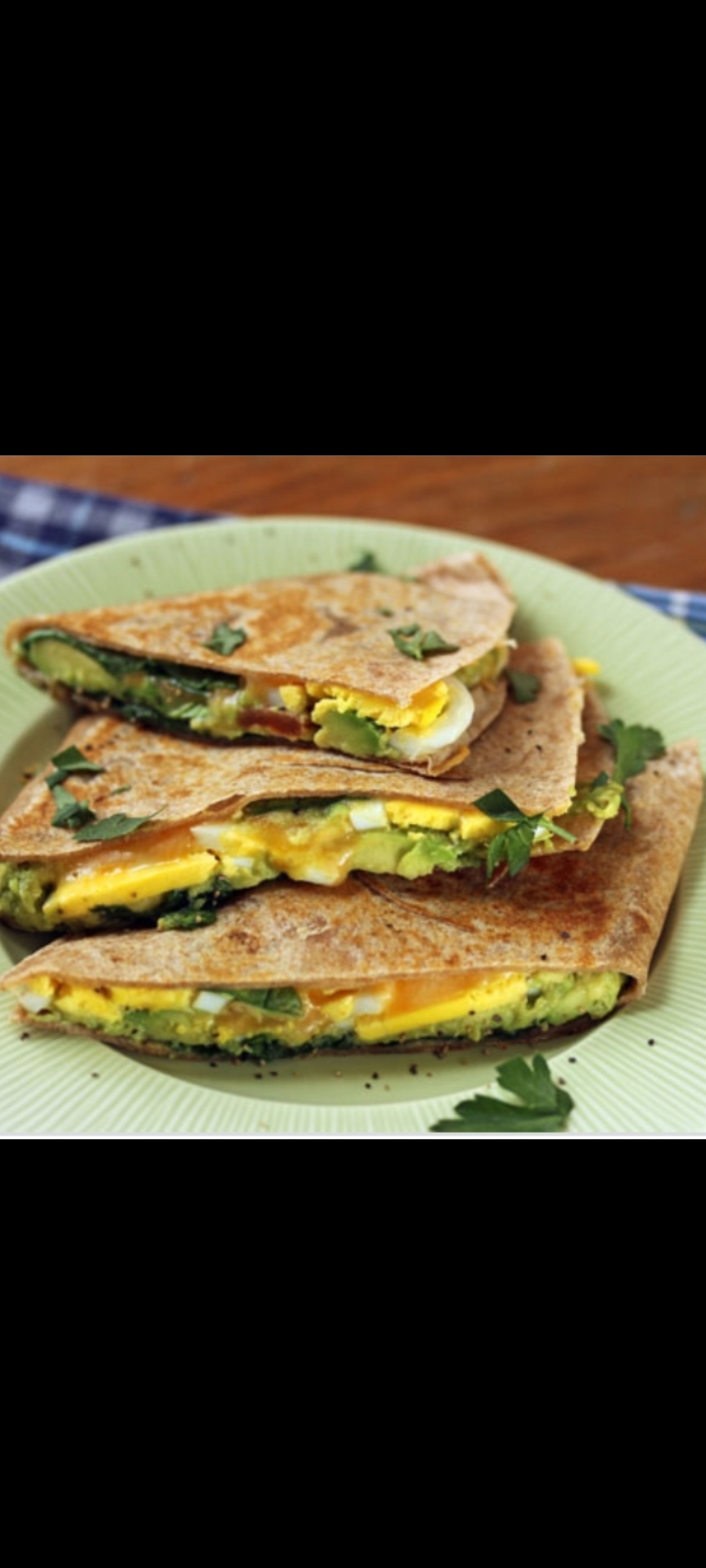Order Eggs Avocado Spinach Green Onions  Cheese Quesadilla & Side Verde Salsa food online from American Gourmet Foods Deli store, New York on bringmethat.com