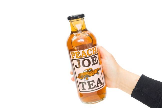 Order Joe Tea Peach Tea food online from Brightwok Kitchen store, Chicago on bringmethat.com