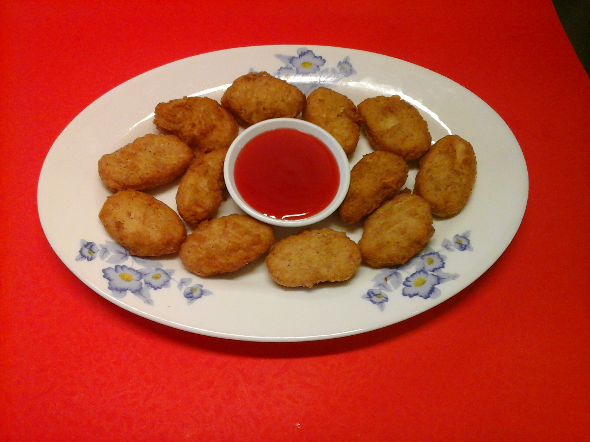 Order 12 Chicken Nuggets food online from New Bamboo Kitchen store, Alameda on bringmethat.com