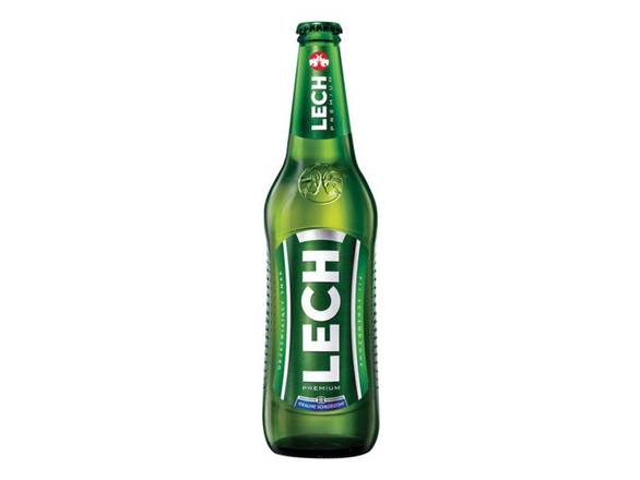 Order Lech Premium Lager - 16.9oz Bottle food online from Sky Liquors store, Chicago on bringmethat.com
