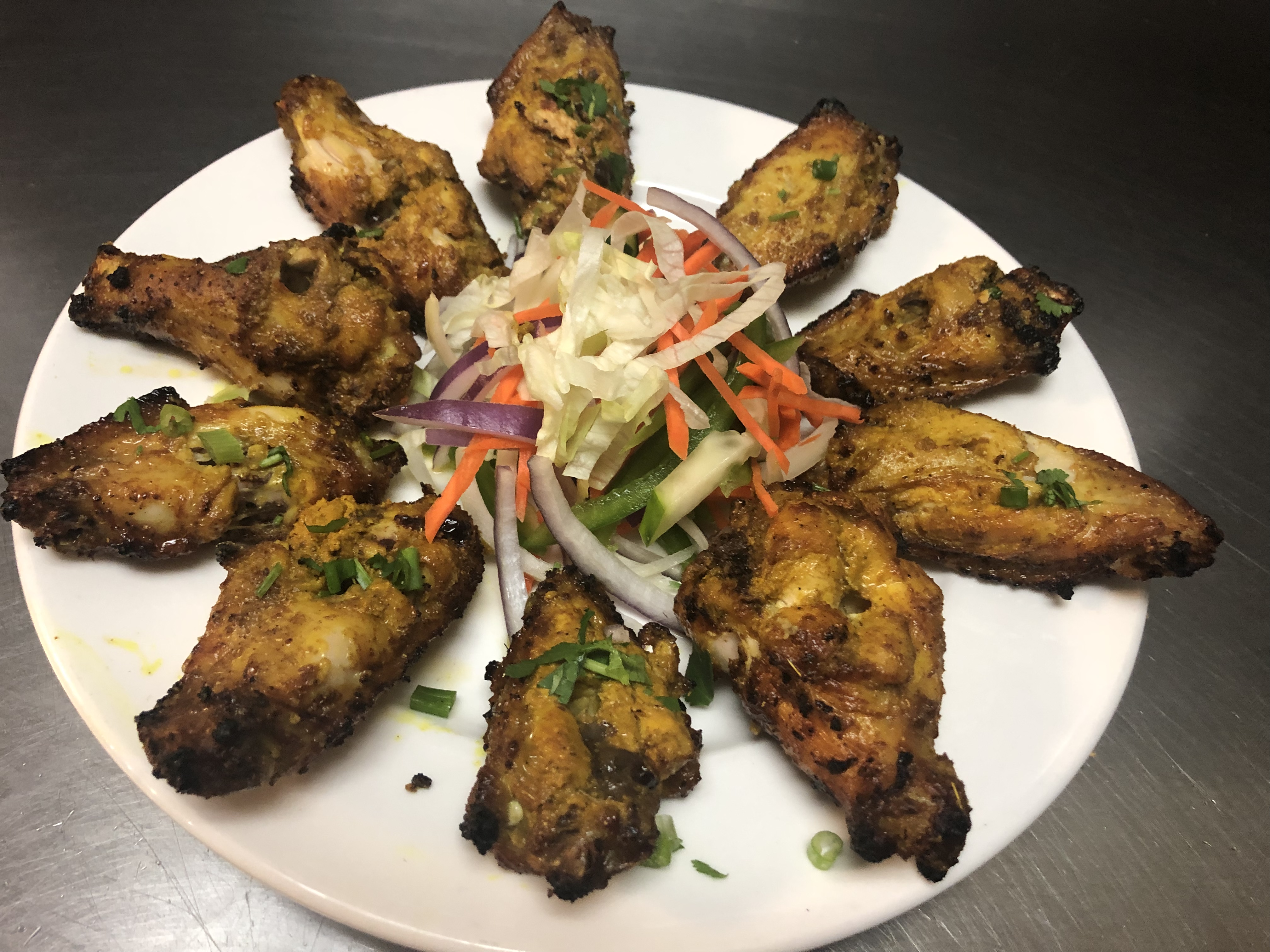Order Tandoori Wings food online from Indish Exotic Indian Restaurant Bar store, Brandywine on bringmethat.com
