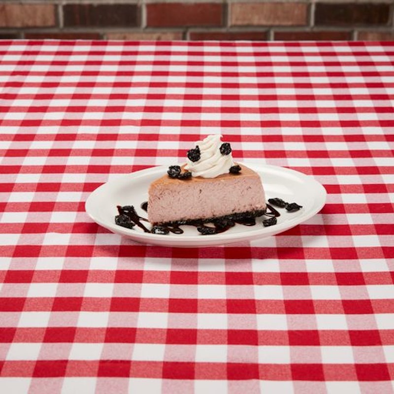 Order Black Cherry Cheesecake food online from Grimaldi Pizzeria store, The Woodlands on bringmethat.com