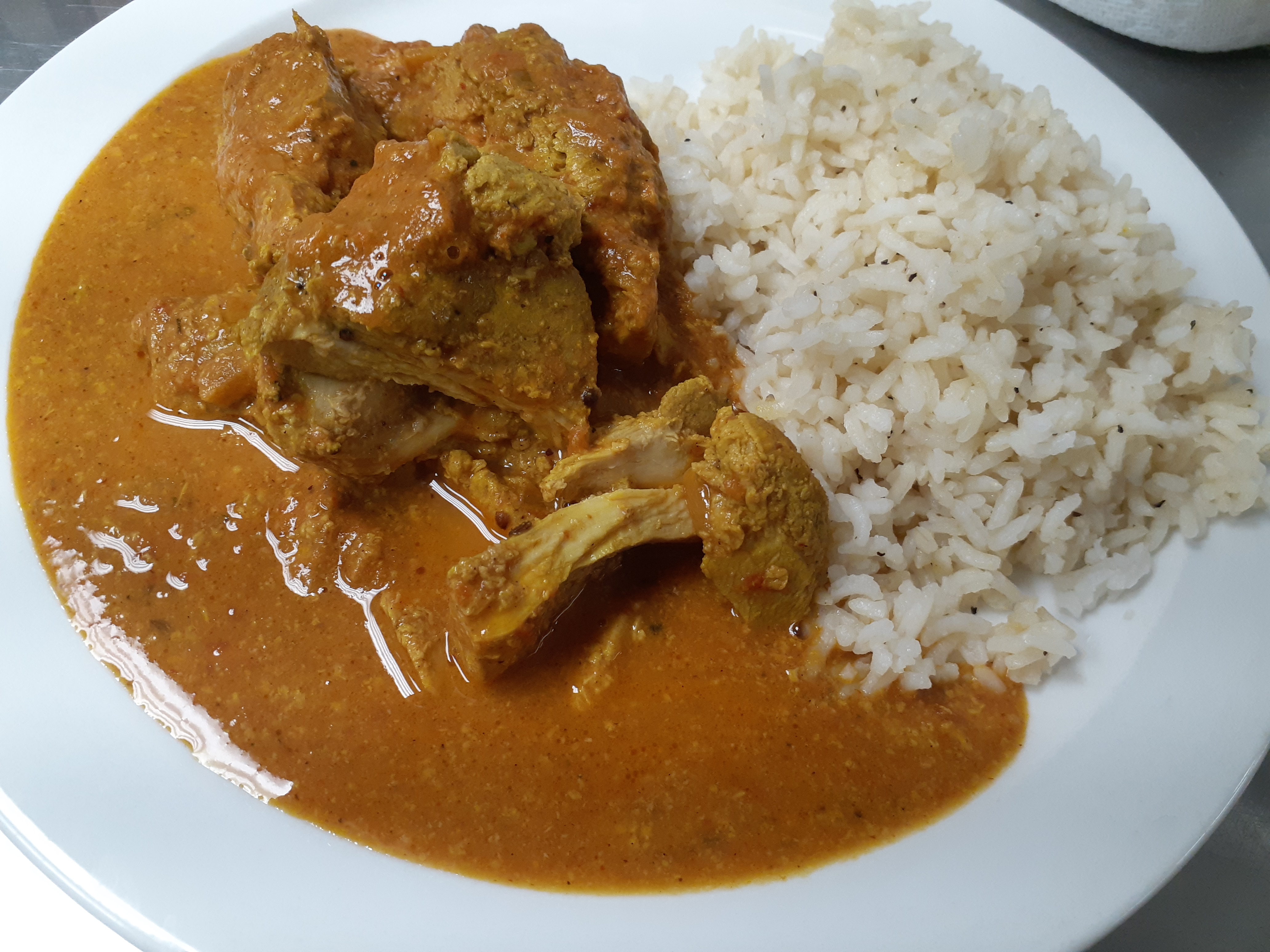 Order Indian Chicken Masala with Rice  food online from Anton store, Roanoke on bringmethat.com