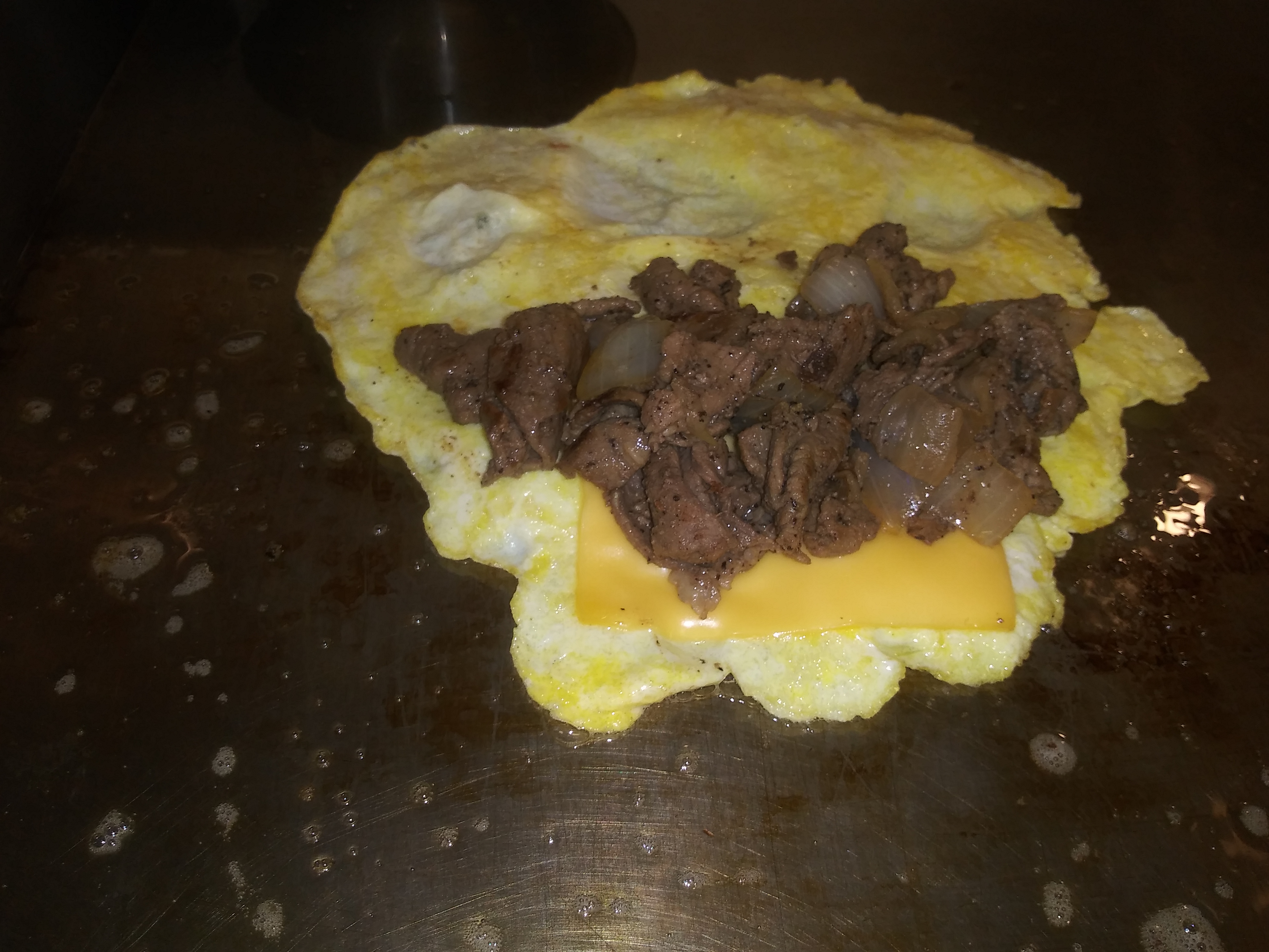 Order Steak, Egg and Cheese Pita food online from The Sheik store, Starke on bringmethat.com