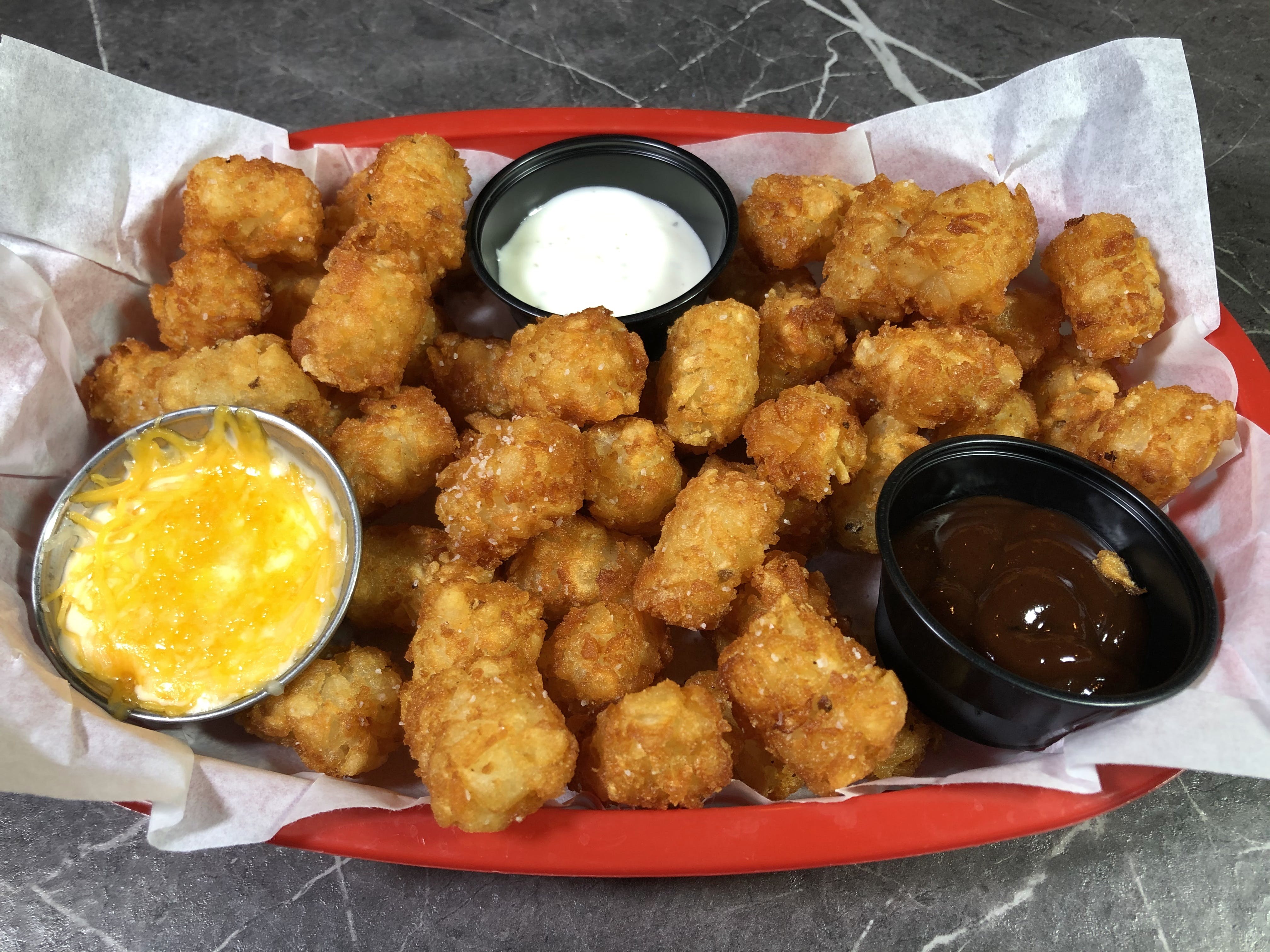 Order Dippin' Tots - For 2 food online from Game Train Usa store, Highlands Ranch on bringmethat.com