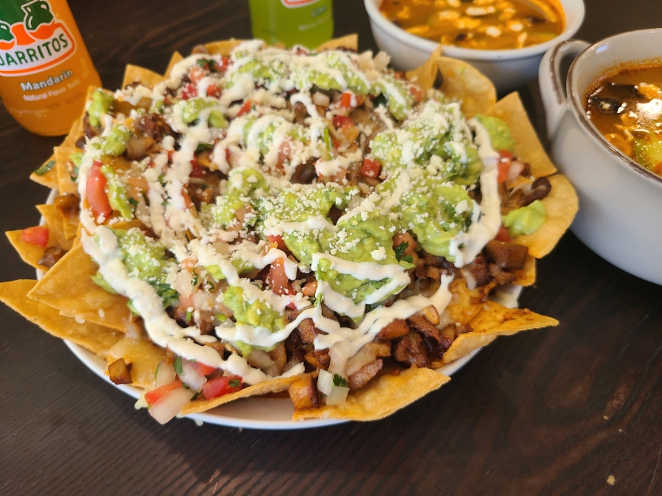 Order Cheese and Meat Nachos food online from Nina Taqueria store, Los Gatos on bringmethat.com