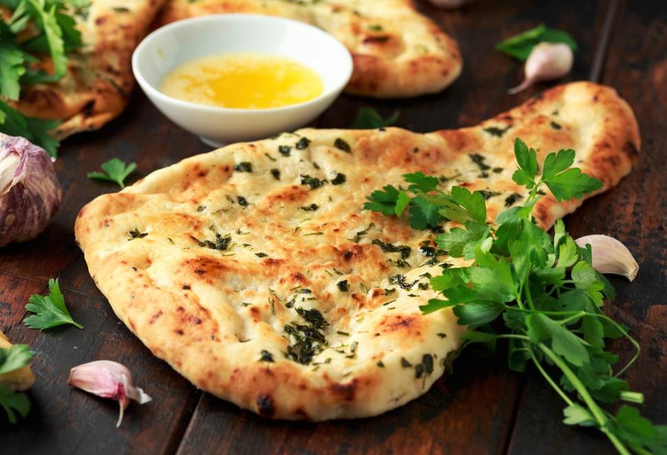 Order Naan OR Roti ( Add comment to choose one) food online from Empyrean Indian Kitchen store, Hoboken on bringmethat.com
