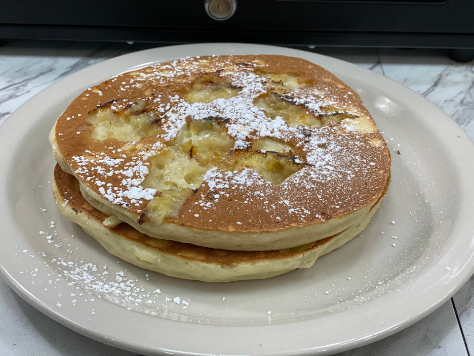 Order 2 BANANA BUTTERMILK PANCAKES food online from Meeting Street Cafe store, Providence on bringmethat.com