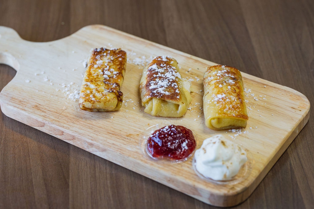 Order Cheese Blintzes food online from Milk And Honey Bistro store, Pikesville on bringmethat.com