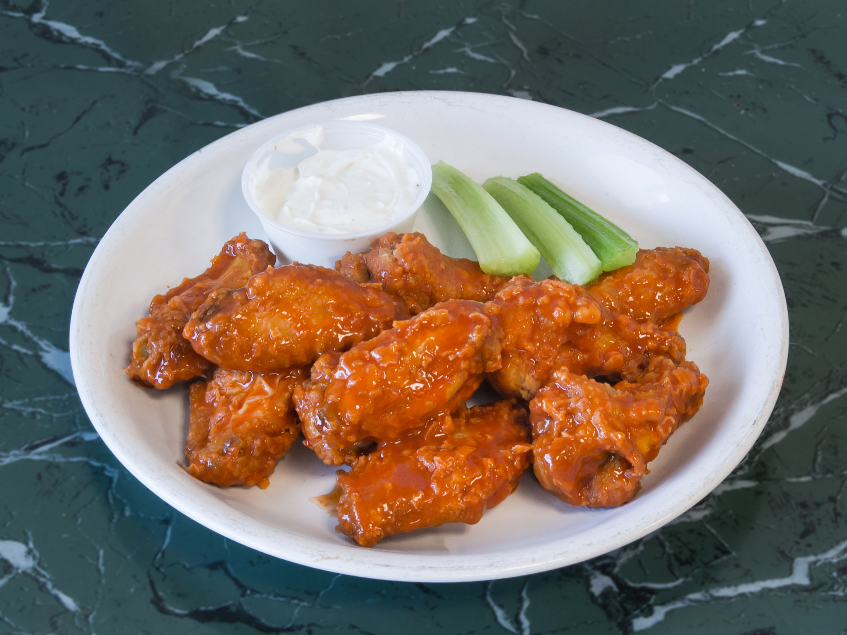 Order .  Buffalo Wings food online from Brother's Pizza store, West Long Branch on bringmethat.com