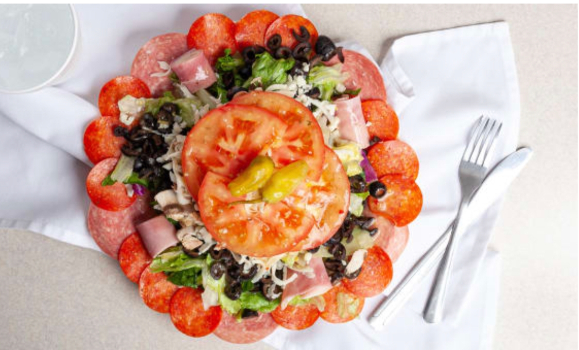 Order Large Antipasto Salad food online from Grumpy Tom Pizza store, San Jacinto on bringmethat.com