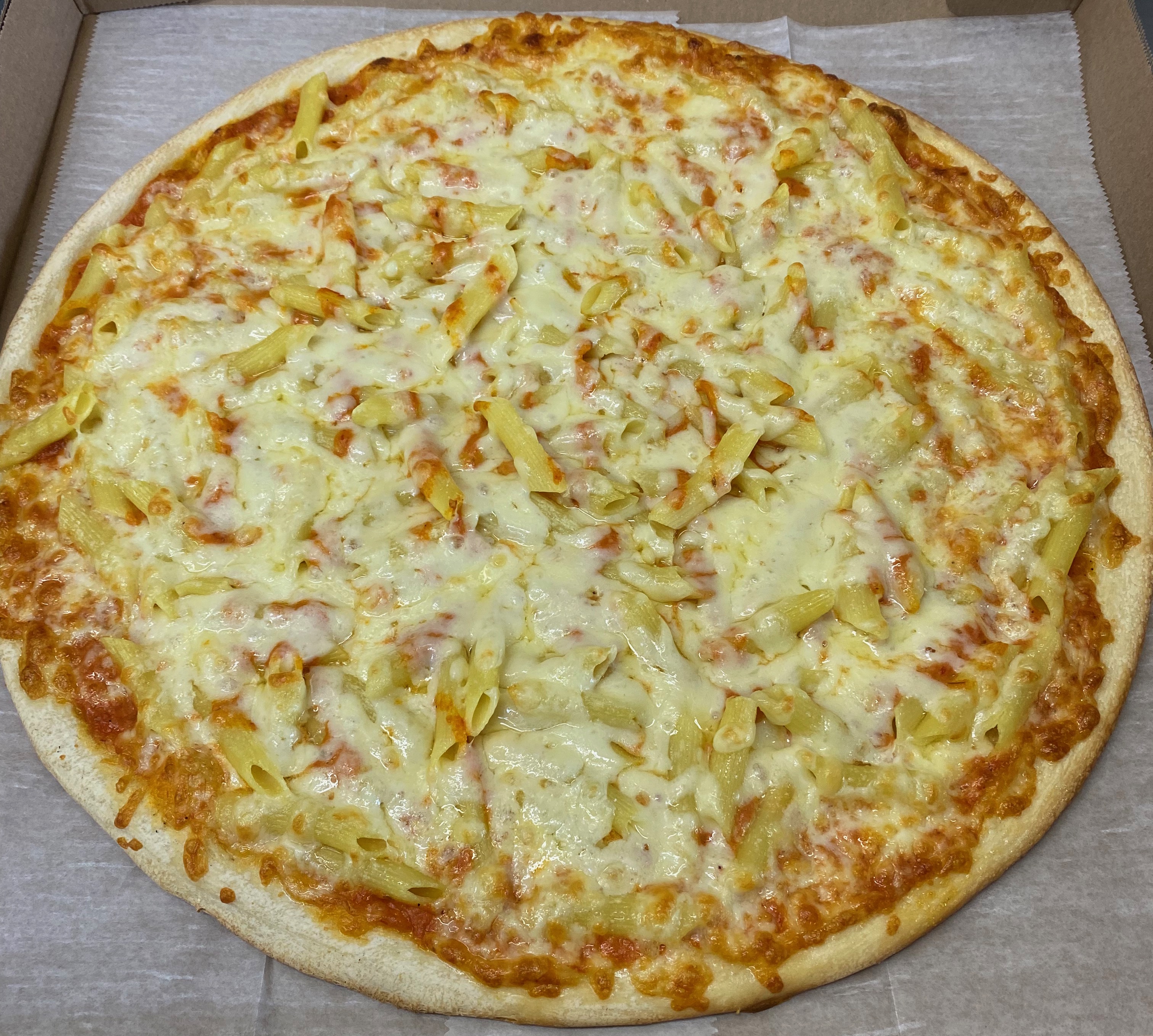 Order 18" Penne Vodka Pie food online from Famous Pizza store, Paramus on bringmethat.com