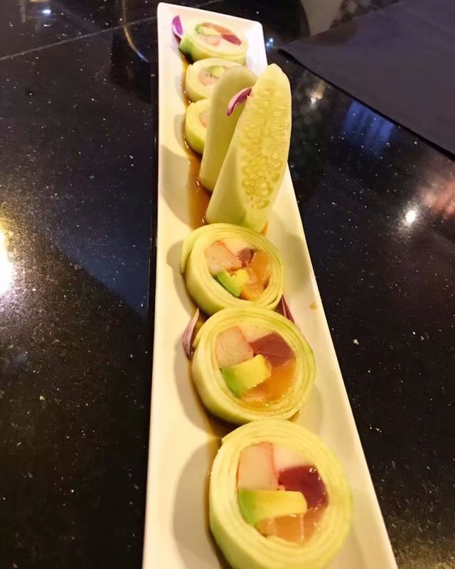 Order Rainbow Naruto Roll food online from Tasty Sushi store, Cary on bringmethat.com