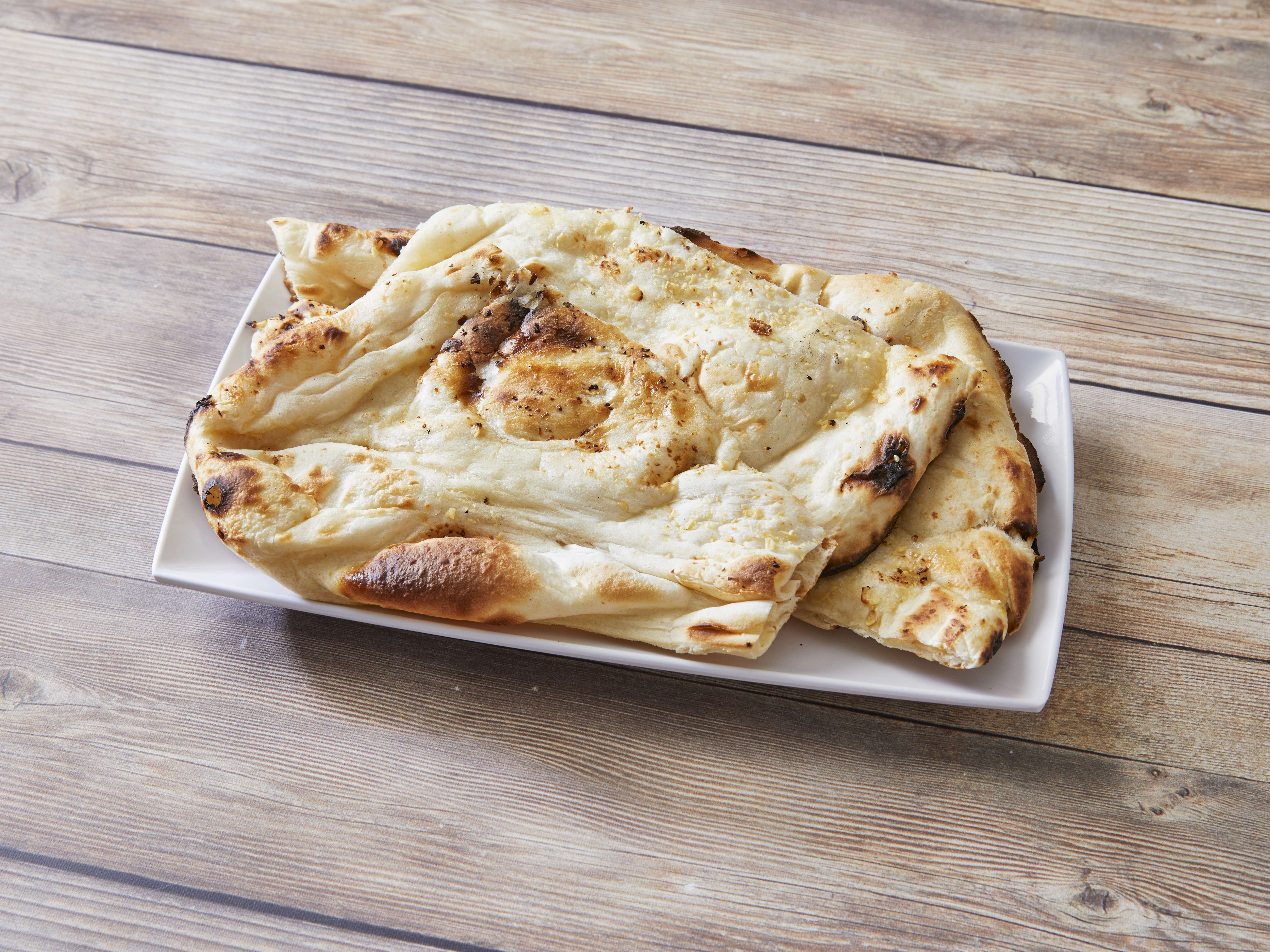 Order Garlic Naan food online from Zaika Indian Cuisine store, Des Plaines on bringmethat.com