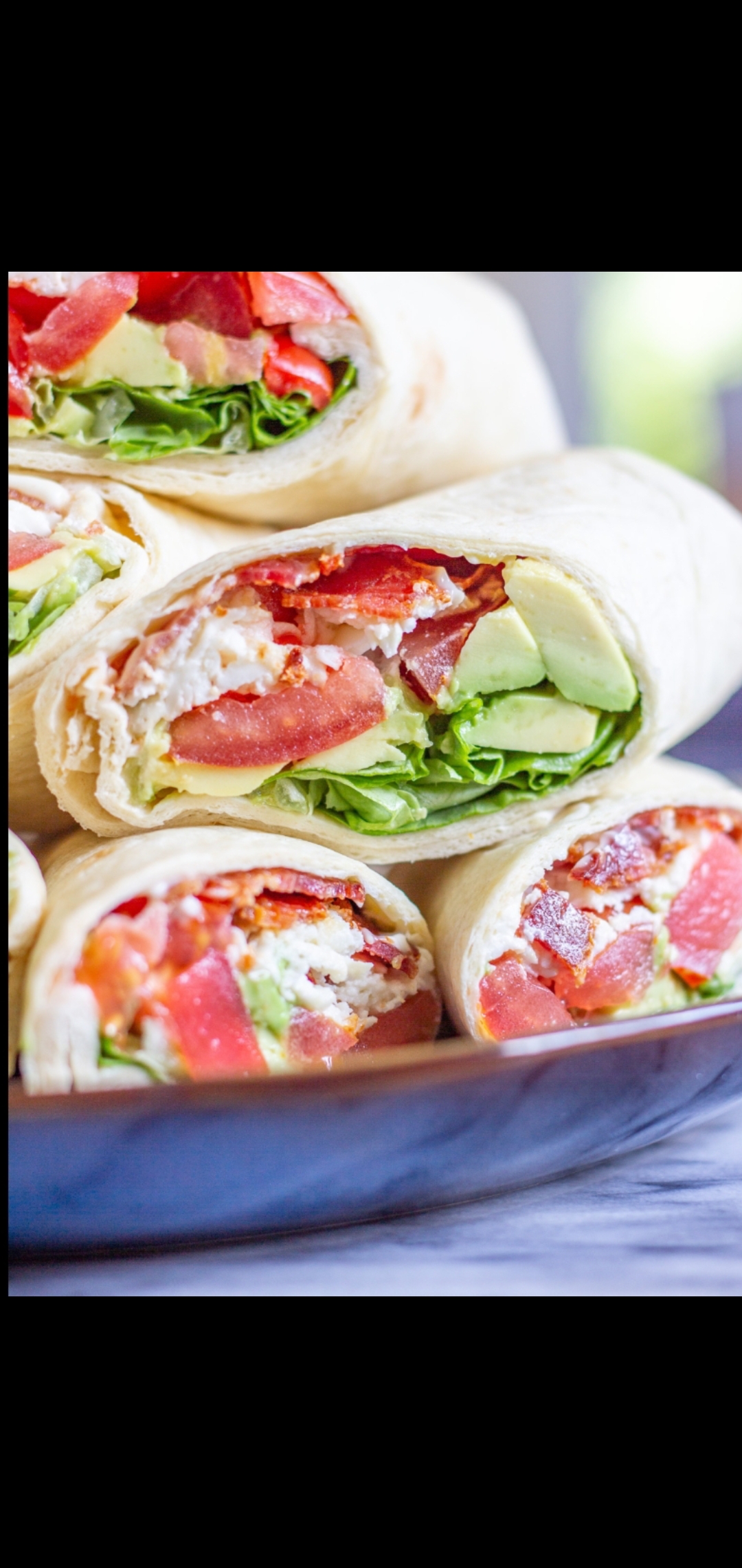 Order BLT Wrap With Avocado &  Cheese  food online from American Gourmet Foods Deli store, New York on bringmethat.com