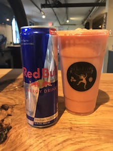 Order Red Bull Sunrise  food online from Wicked Loft store, Whitman on bringmethat.com