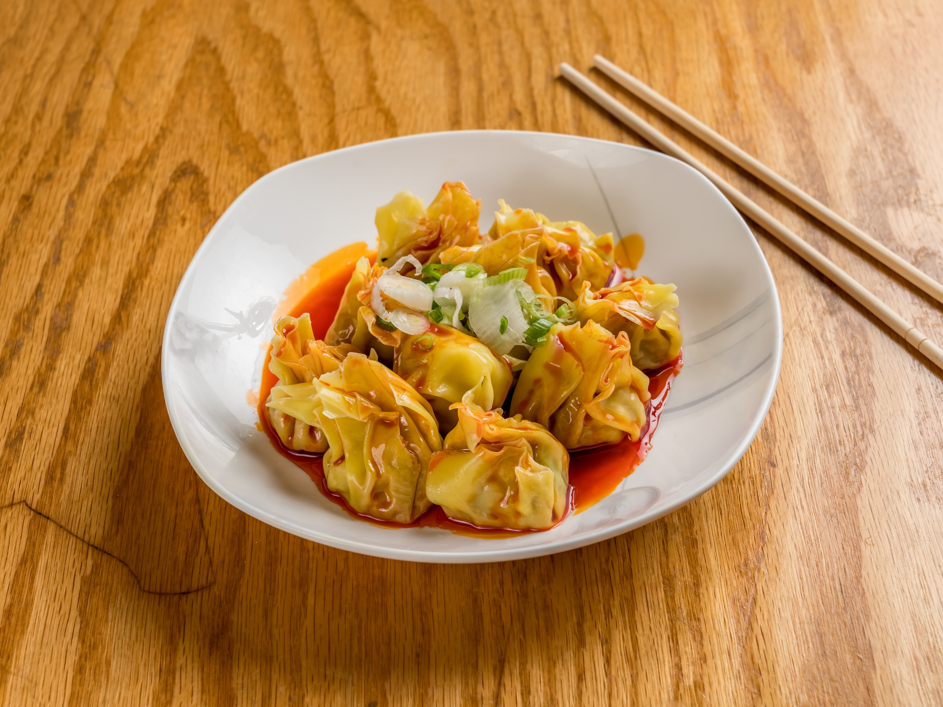 Order A12. Wonton Szechuan Style food online from 1089 Noodle House store, Stony Brook on bringmethat.com
