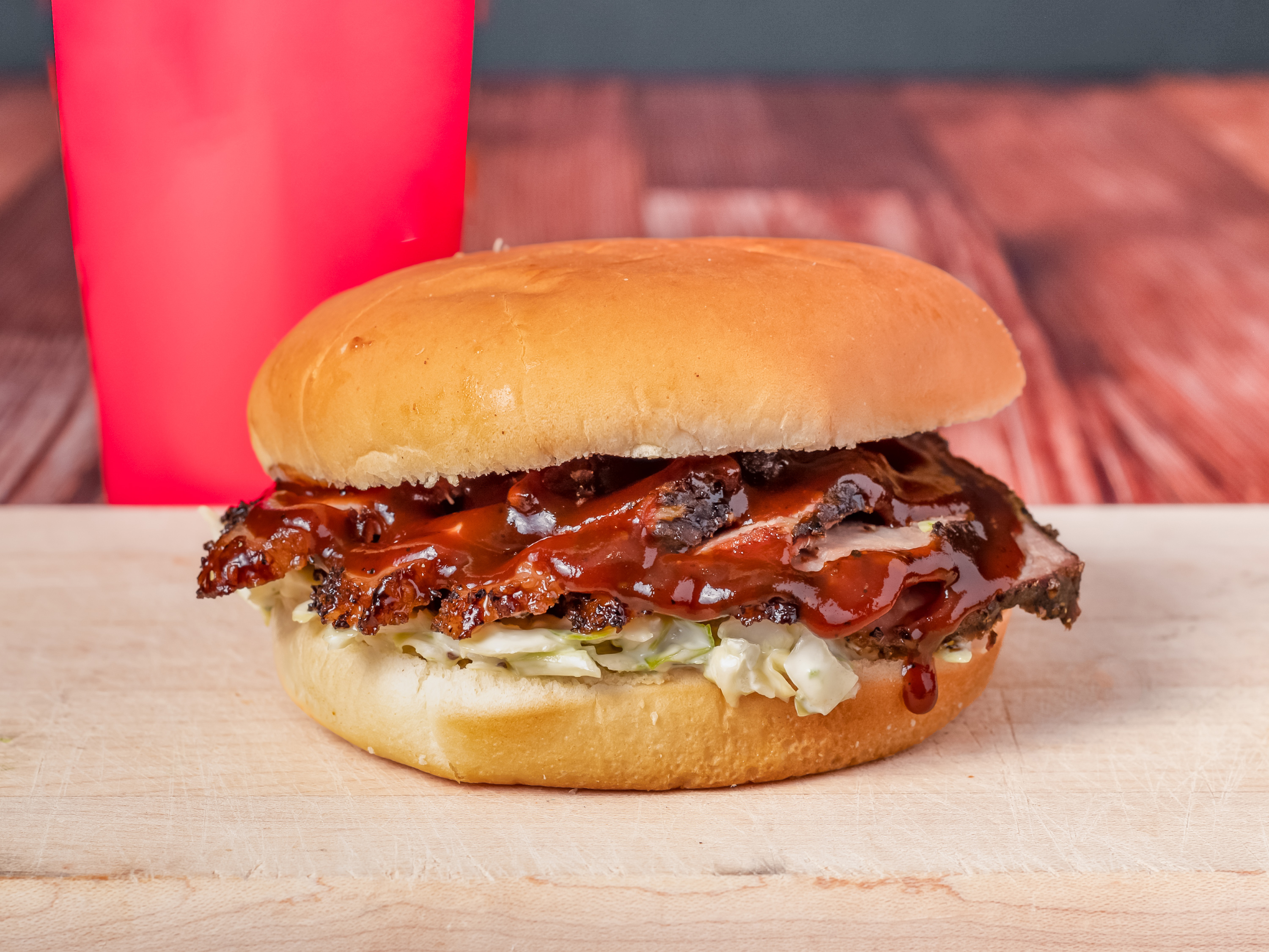 Order Beef Brisket Sandwich food online from Tops Bar-B-Q store, Southaven on bringmethat.com