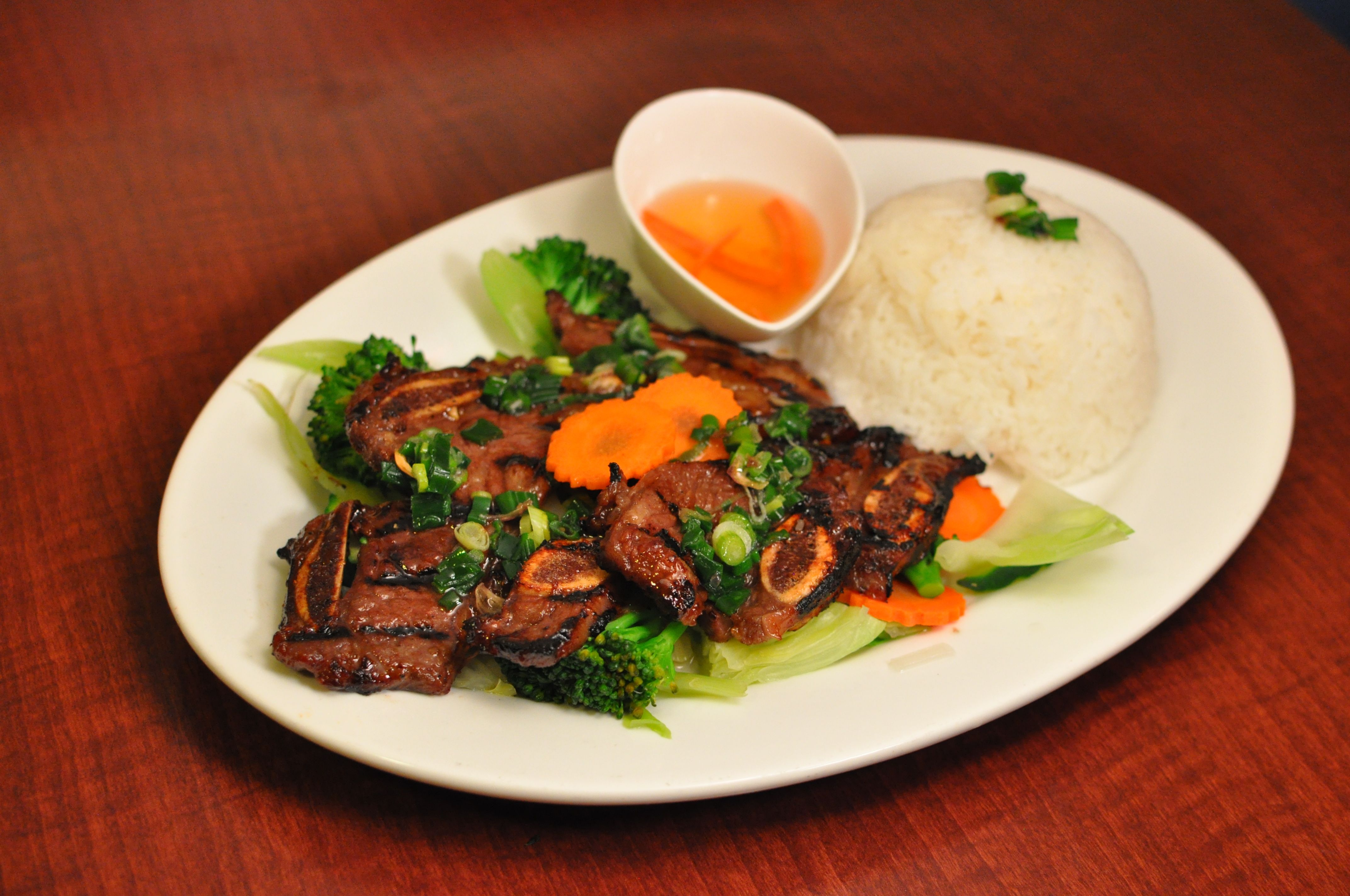 Order D15. Rib-Beef Kalbi Platter food online from Dang Vietnamese Restaurant store, Bend on bringmethat.com