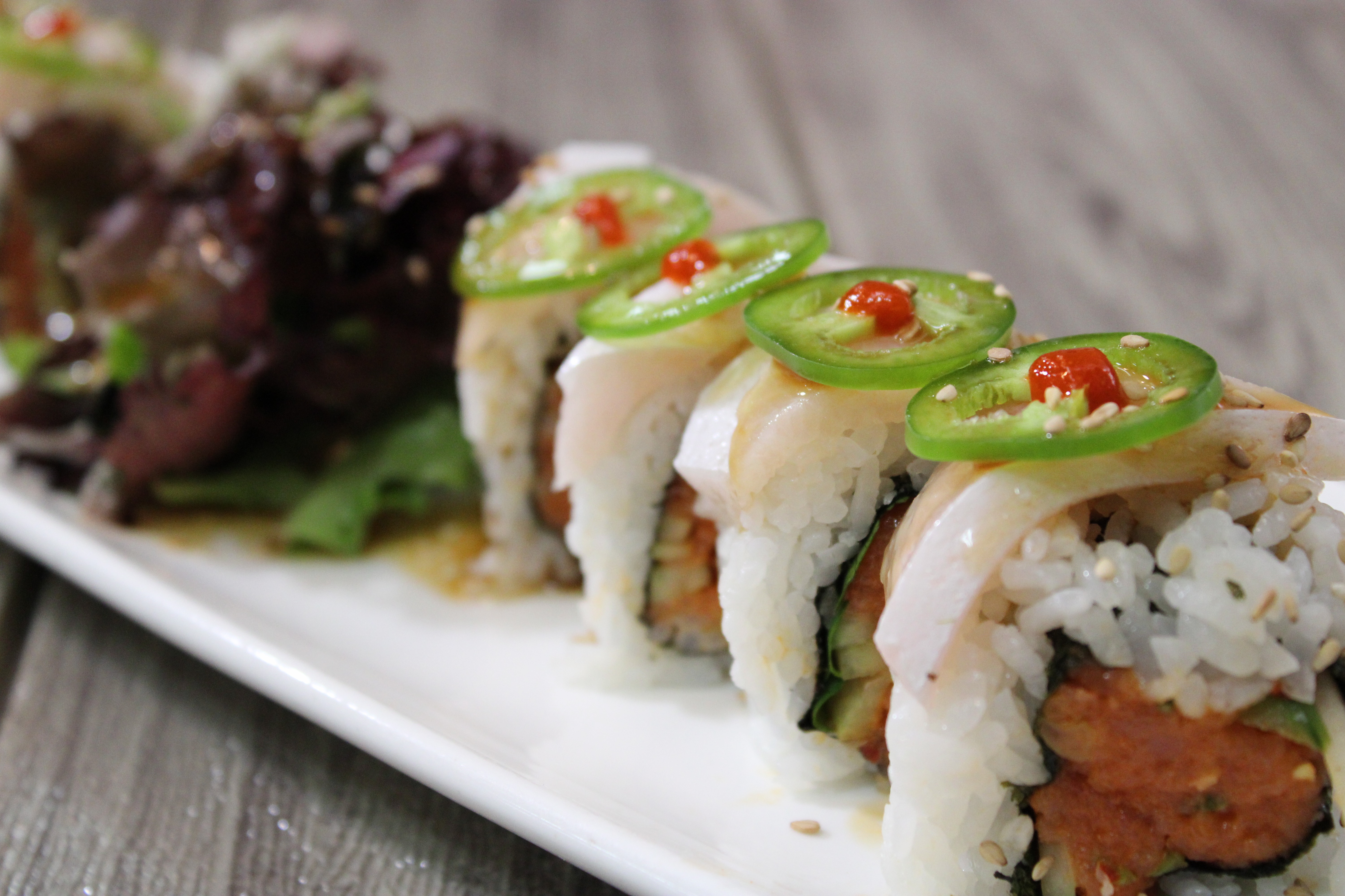 Order Yellowtail Lover Roll food online from Kibo Sushi store, Ventura on bringmethat.com