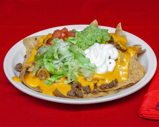 Order Nachos the Works food online from Raymond's Tacos store, Chicago on bringmethat.com