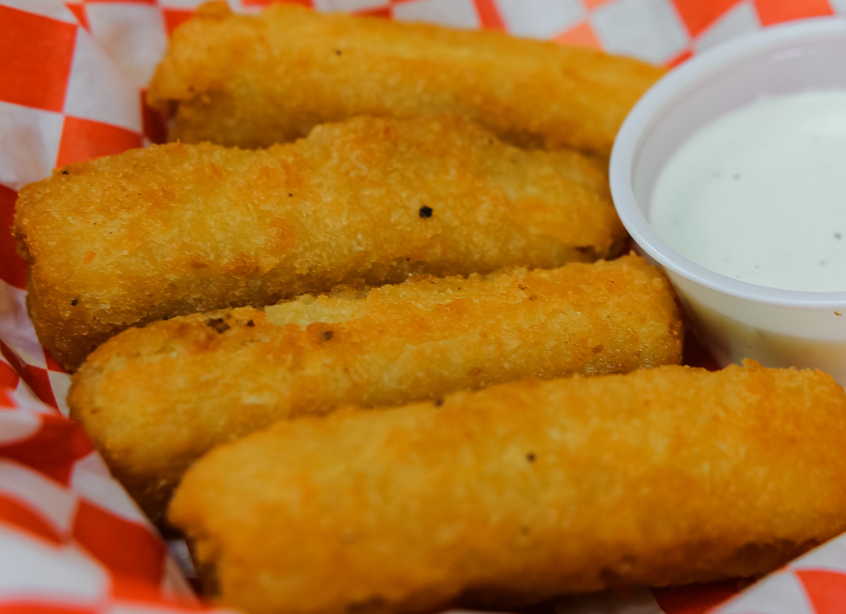 Order 4 Piece Cheesy Sticks food online from Burgers N Beyond store, Fort Worth on bringmethat.com