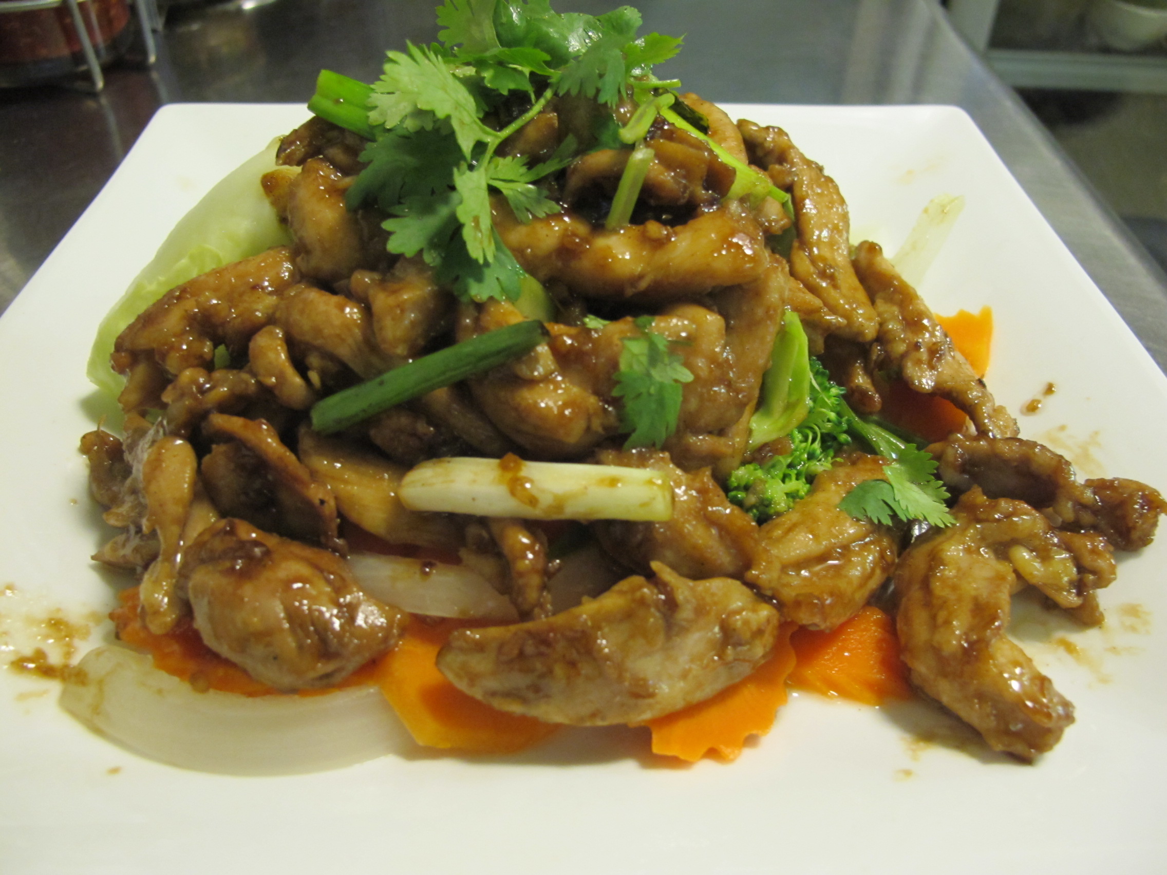 Order 75. Pad Garlic Pepper food online from Thailand Restaurant store, Modesto on bringmethat.com