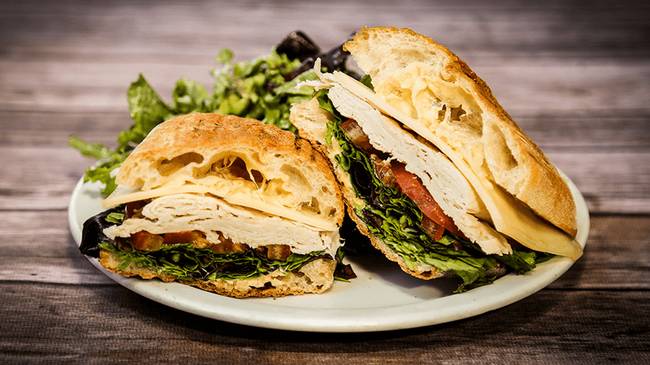 Order Oven Roasted Turkey Panini food online from Coupa Cafe store, Palo Alto on bringmethat.com