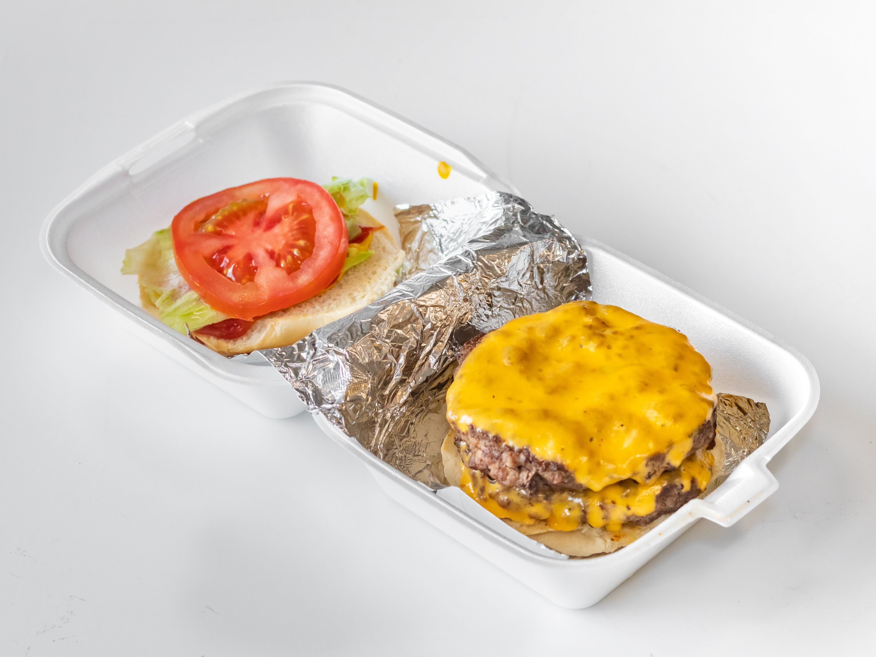 Order Double Cheeseburger  food online from Mama Hotdogs store, Akron on bringmethat.com