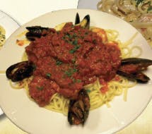 Order Linguini with Mussels - Pasta food online from Nino Italian Restaurant store, Reading on bringmethat.com