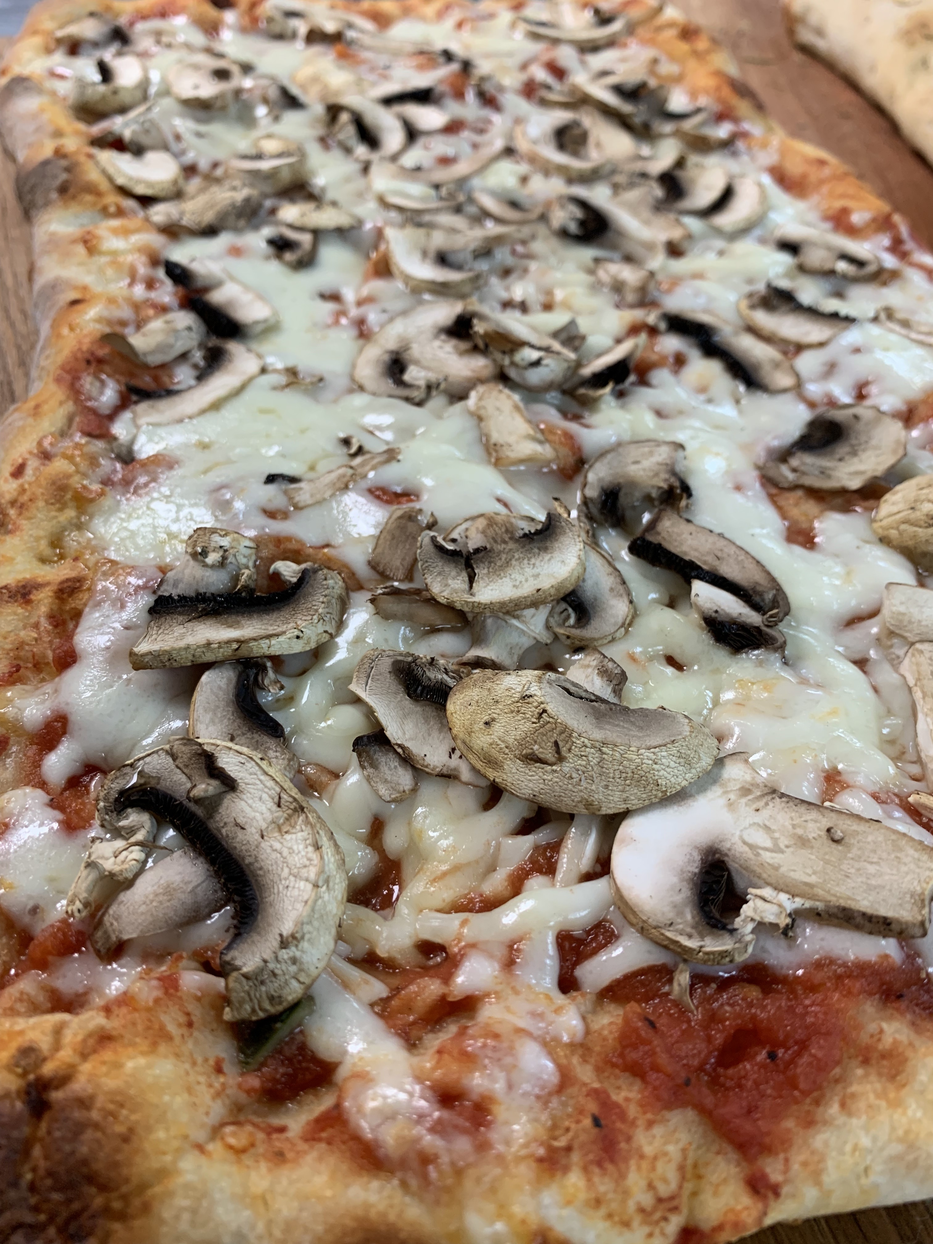 Order Mushroom pizza food online from IL Baretto To Go store, New York on bringmethat.com