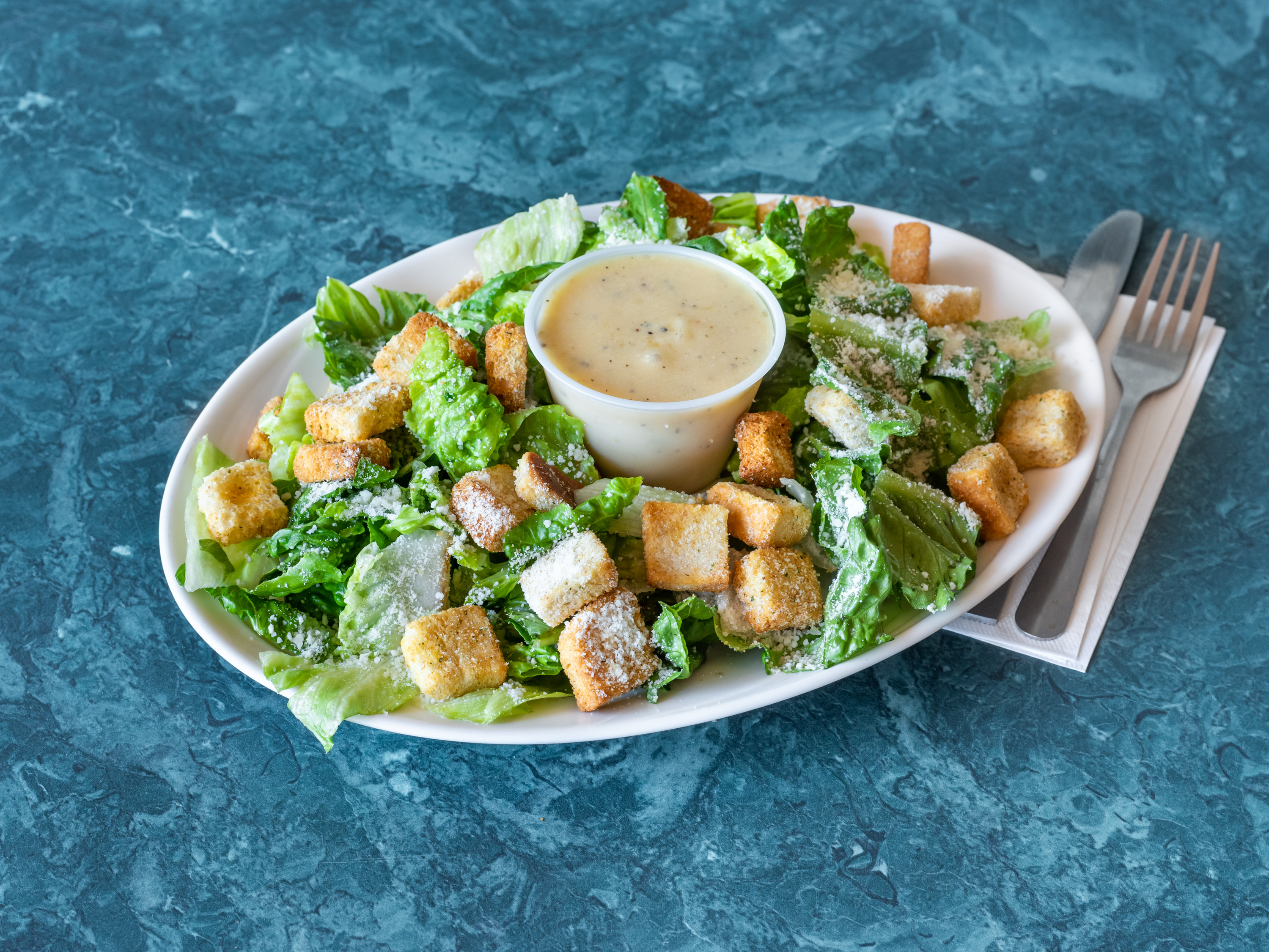 Order Caesar Salad food online from Guidos Pizza store, Eatontown on bringmethat.com